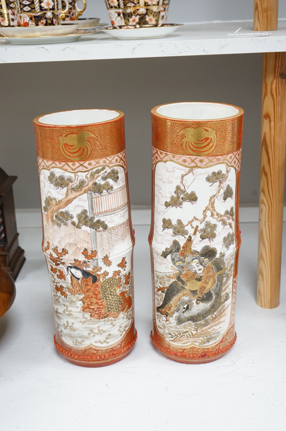 A pair of large Japanese Kutani bamboo shaped vases, Meiji period, 37.5cm high